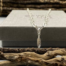 Load image into Gallery viewer, Feather charm trace chain necklace in Sterling Silver
