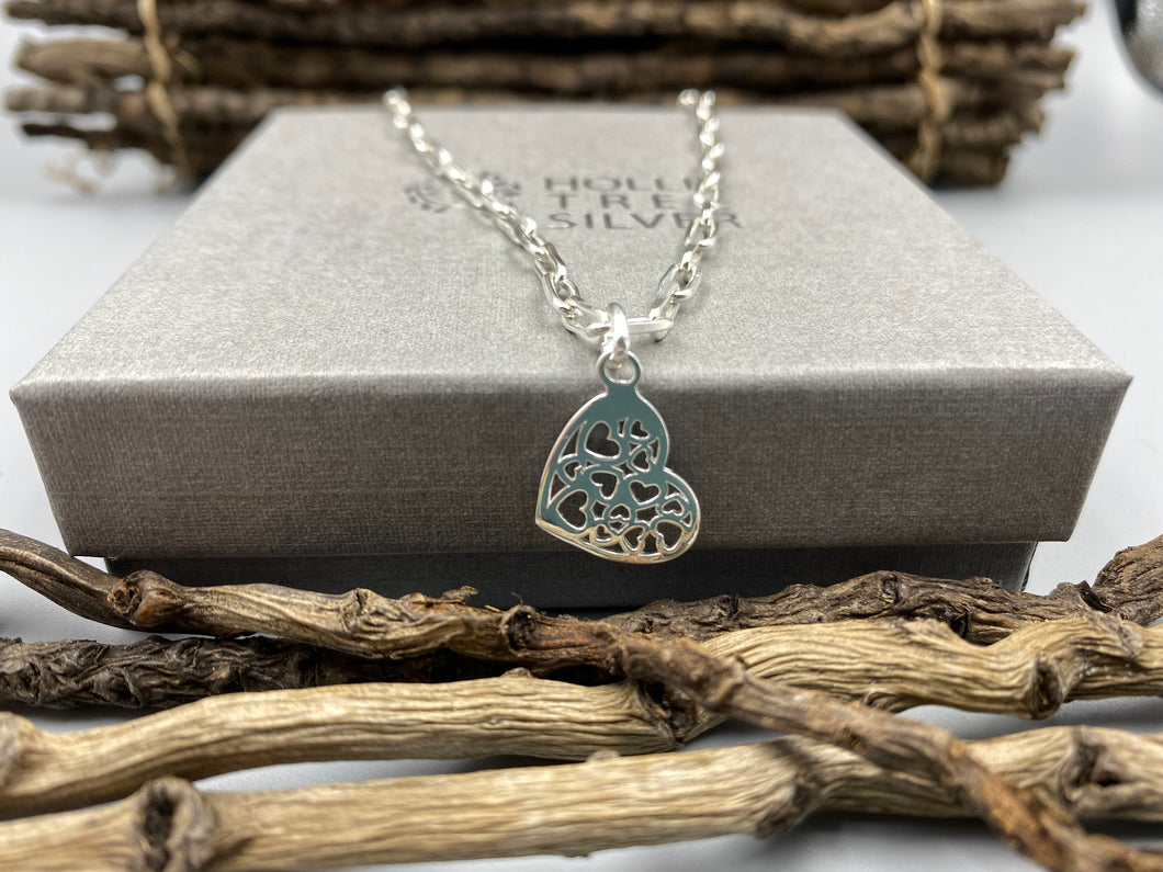 Hearts in a heart charm trace chain necklace in Sterling Silver