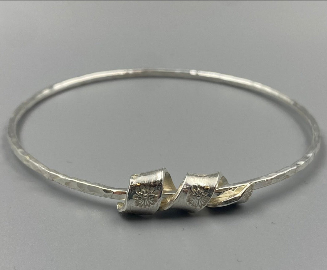 Daisy swirl dimpled bangle in Sterling Silver - April Birthday