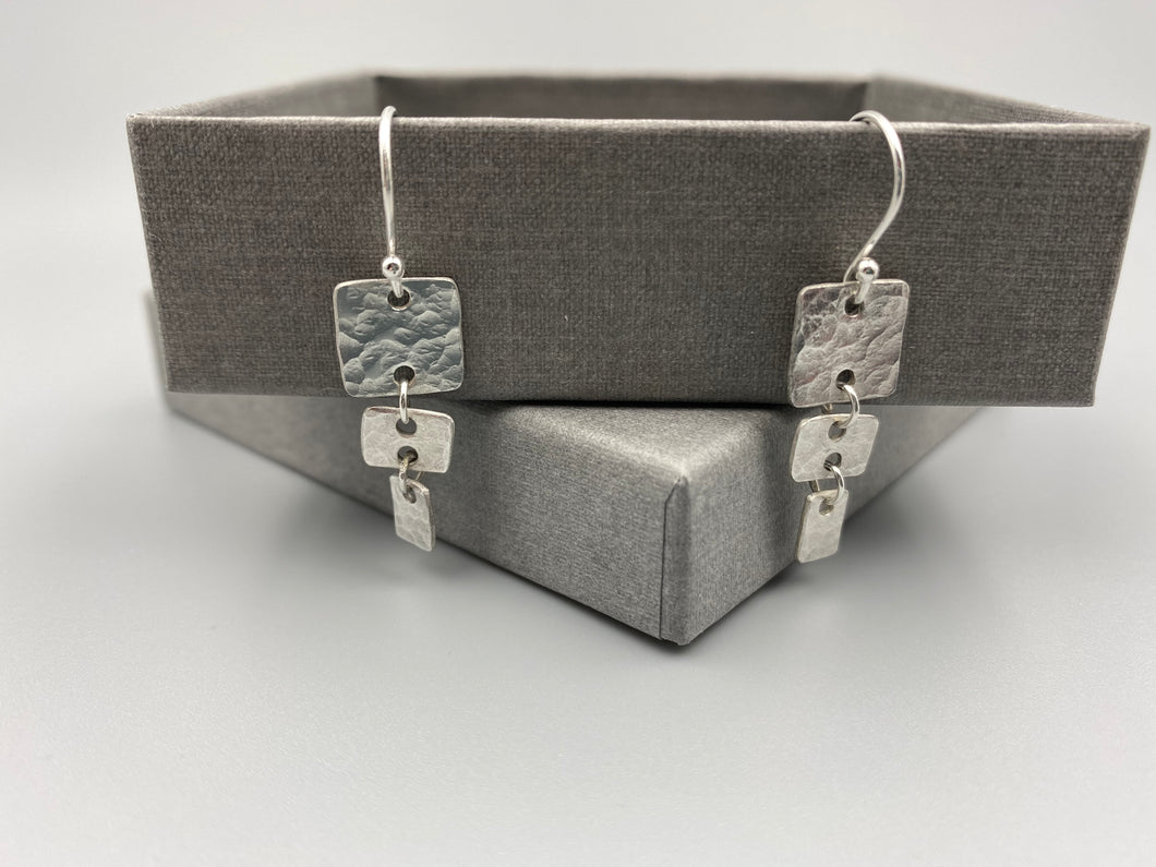 Square and rectangle dimpled long drop silver earrings